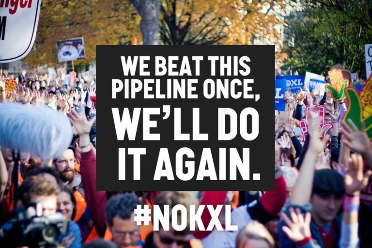 Image of climate marchers with text "We beat the KXL Pipeline Once, we'll do it again"