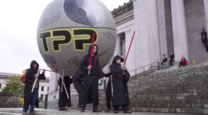Activists dressed as sith lords with Death Star advocating against the Trans-Pacific Partnership in front of Washington state capitol building in Olympia